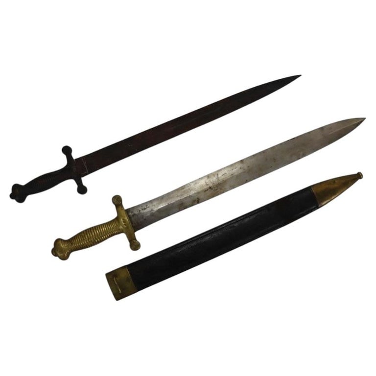 2 French Model Artillery Short Swords 19thC: 2 French Model Artillery Short Swords 19thC. Measures - 25.25"H x 4"W x 1"D. *** OPTIONAL IN-HOUSE SHIPPING & DELIVERY - While onsite retrieval is always welcome at no charge, IN-HOUSE SHIPPING & DELI