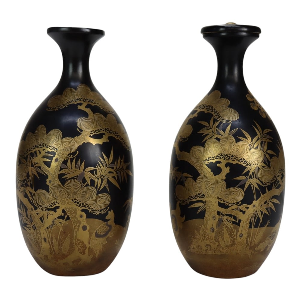 Pair Antique Japanese Black Lacquer & Hand Painted Gilt Animals 19thC: Pair Of Antique Japanese Black Lacquer & Hand Painted Gilt Animals, Trees & Wheel Of Dharma Marriage Sake Bottles, Platic, Unsigned 19thC. Measures - 8.5"H x 4"W x 4"D. *** OPTIONAL IN-HOUSE SHIPPING