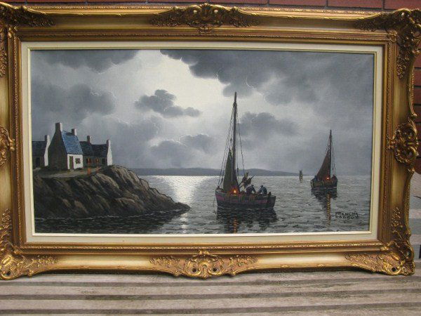 OIL ON CANVAS - FRANCOIS CARBU: EVENING HARBOUR SCENE WITH FISHING BOATS, WITHIN A FANCY GILT FRAME 21" X 39"