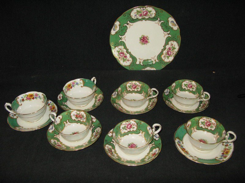 ROYAL SWANSEA PARTIAL DINNER SERVICE: ELEVEN DINNER PLATES IN "OLD SEVRES" PATTERN AND ELEVEN DINNER PLATES AND SEVEN CUPS AND SAUCERS , SOME IN FENTON, SAME PATTERN
