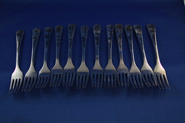 SET OF TWELVE IRAQI DESSERT FORKS: FULLY ENGRAVED WITH ARABIAN SCENE PROBABLY 850-900 SILVER CONTENT 291 G 6" L