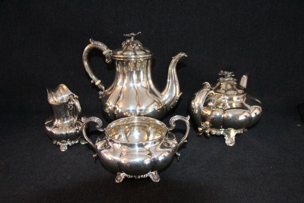 FOUR PIECE WILLIAM IV STERLING TEA SERVICE: MELON FORM DATED 1833, MAKER CHARLES GORDON TEAPOT, COFFEE POT, OPEN SUGAR ALL MOUNTED ON FOUR SCROLLED FEET SUPPORTING BODY WITH ACANTHUS DECORATED SPOUT AND HANDLE SURMOUNTED WITH FLOWER HEAD. CREAM