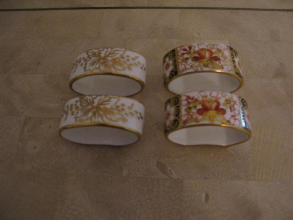 FOUR ROYAL CROWN DERBY NAPKIN RINGS: TWO VINE PATTERN, TWO IMARI PATTERN 2.25" L