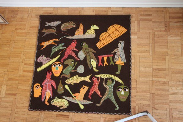 INUIT EMBROIDERY COLLAGE: VARIOUS FIGURES RELATED TO THE MYTHOLOGY OF THE INUIT PEOPLE 36" X 36"