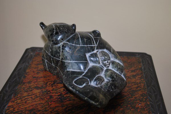 INUIT STONE CARVING: IGLOO AND HUNTER SIGNED TO BASE 852 AS FOUND 9" L