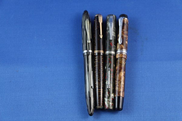FOUR ASSORTED PENS: PARKER 14K AUTOMATIC DEGUSSA SCHAEFER 5-30 WATERMAN IDEAL
