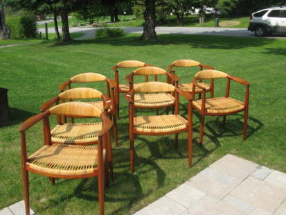 SET OF EIGHT JOHANNES HANSEN "THE CHAIR" MODEL 501: DESIGNED BY HANS J. WEGNER (1914-2007) IN VERY GOOD CONDITION PURCHASED IN 1959 THERE IS A SMALL AMOUNT OF CANING BROKEN ON EACH CHAIR. PLEASE SEE PICTURES FOR DETAILS.