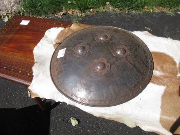 ANTIQUE MILITARY METAL SHIELD FROM RAJASTHAN INDIA: GIFT FROM THE LAST MAHARAJAH OF KOTAH, RAJASTHAN, INDIA INSCRIBED WITH CENTRAL MOTIF OF A BIRD 18" D