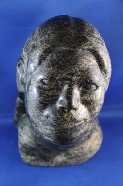 INUIT FEMALE BUST MOTTLED STONE CARVING: FEMALE BUST SIGNED TO BASE "HENRY" ATTRIBUTED TO HENRY EVALUARDJUK (1923-2007) 10.5" X 7"