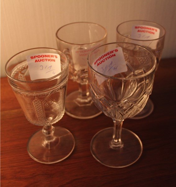 FOUR VARIOUS PRESSED GLASS GOBLETS: CANADIANA