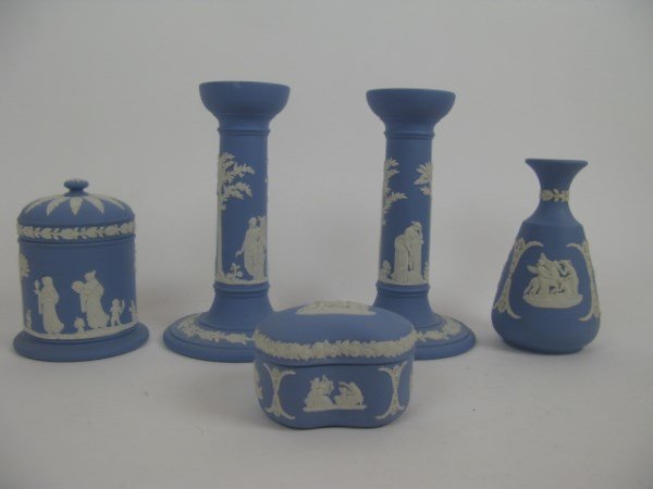 FIVE PIECES OF WEDGWOOD JASPERWARE: CIGARETTE BOX WITH LID, 4.5" H, KIDNEY SHAPED DRESSER BOX WITH LID, 1.75" H X 2.75" W, BUD VASE, 5.25" H, PAIR OF CANDLESTICKS, 6.75" H, ONE WITH SMALL CHIP TO RIM