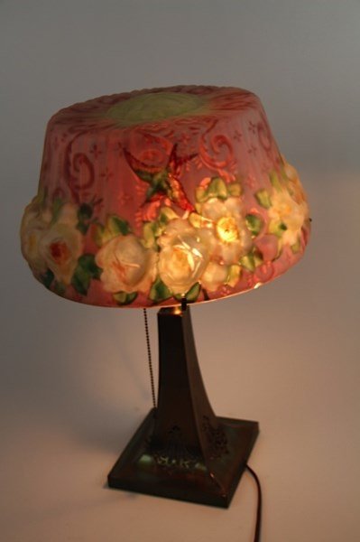 ORIGINAL HUMMINGBIRD AND ROSES PAIRPOINT LAMP: PAIRPOINT LAMP WITH STRATFORD SHAPED SHADE ORIGINAL BASE WITH SPIDER BRACKET WITH ORIGINAL SIGNED (DIE STAMPED CAPITAL "P" INSIDE A DIAMOND) AND ORIGINAL LABELSMALL CHIP ON THE UNDERSIDE OF THE SHADE,