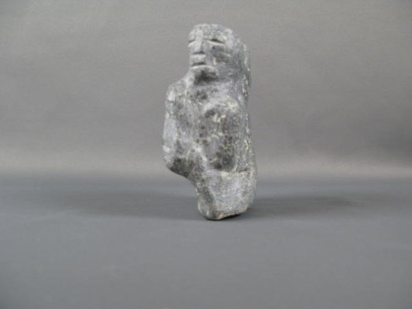 INUIT CARVED STONE MOTHER WEARING AMAUTI: ATTRIBUTED TO MARY AYAQ ANOWTALIK, UNSIGNED, CIRCA 1970'S 4.5" X 3.5" X 1.5"