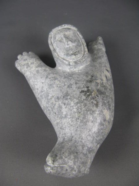 INUIT CARVED STONE SHAMAN MAN/BEAR TRANSFORMATION: INUIT CANADIAN, UNIDENTIFIED ARTIST, CIRCA 1970'S 2.25" X 6" X 4"