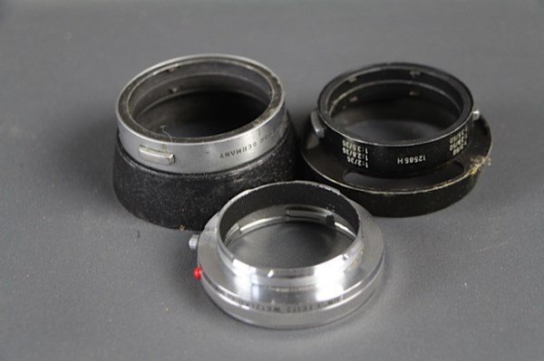THREE LEICA CAMERA LENS ATTACHMENTS: FOR VARIOUS LENSES