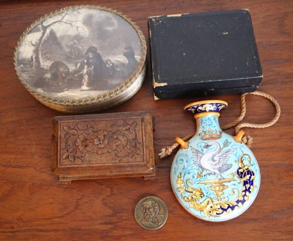 SET OF FIVE ASSORTED PIECES: FRENCH FAIENCE BLUE AND YELLOW WALL POCKET, 1880 FRENCH BIBLE WITH CASE, EMBROIDERED DRESSER BOX CIRCA 1920, SMALL WALNUT CARVED JEWEL CHEST, BRONZE DICKENS COIN