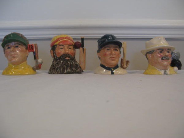 FOUR ROYAL DOULTON SPORTS CHARACTER JUGS: D6896 - THE BOWLS PLAYER - SMALL D6878 - THE BASEBALL PLAYER - SMALL D6845 - THE CHAMPION - W.G. GRACE - SMALL LIMITED EDITION 3580/9500 D6865 - THE GOLFER - SMALL