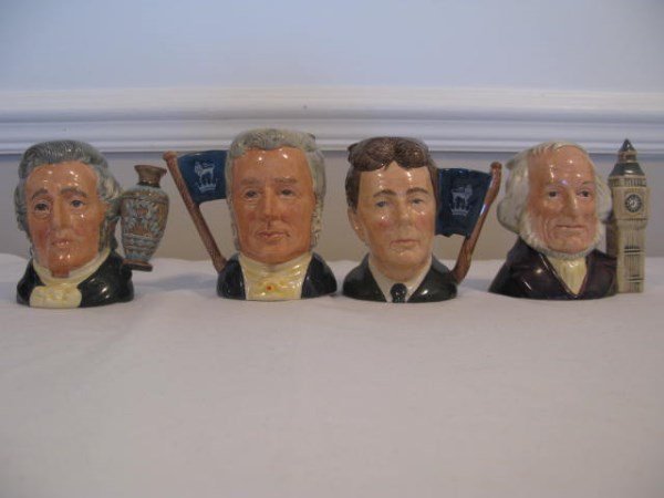 FOUR SIR HENRY, MICHAEL AND JOHN DOULTON JUGS: SIR HENRY D6703 - TINY SIR HENRY & MICHAEL DOULTON D6921 - SMALL AUTOGRAPHED BY MICHAEL DOULTON 1992 MICHAEL DOULTON D6808 - SMALL JOHN DOULTON D6656 - EIGHT O'CLOCK HANDLE - SMALL