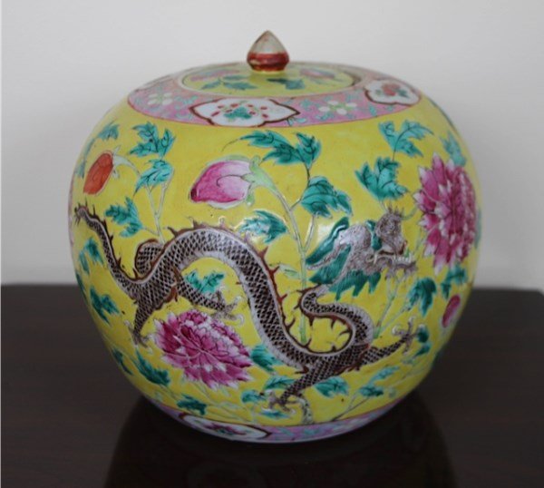 PAIR OLD YELLOW CHINESE MELON JARS: WITH DRAGON AND CHRYSANTHEMUM MOTIF ON A YELLOW FIELD, NO MARKS TO BASE, DAMAGE TO BOTH LIDS 9" H