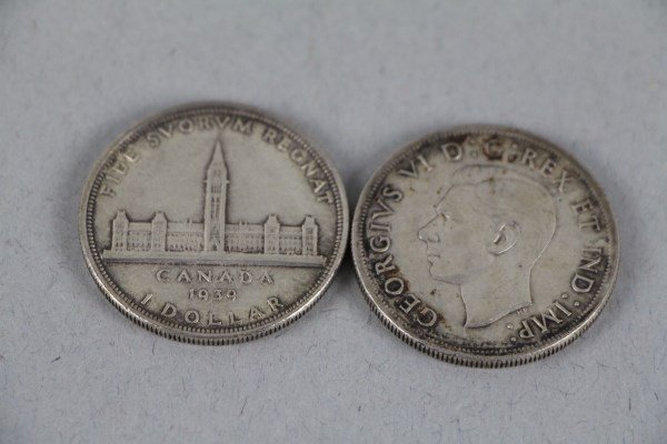 TWO 1939 CANADIAN DOLLARS + 1958 B.C. TOTEM DOLLAR: NEARLY UNCIRCULATED CONDITION