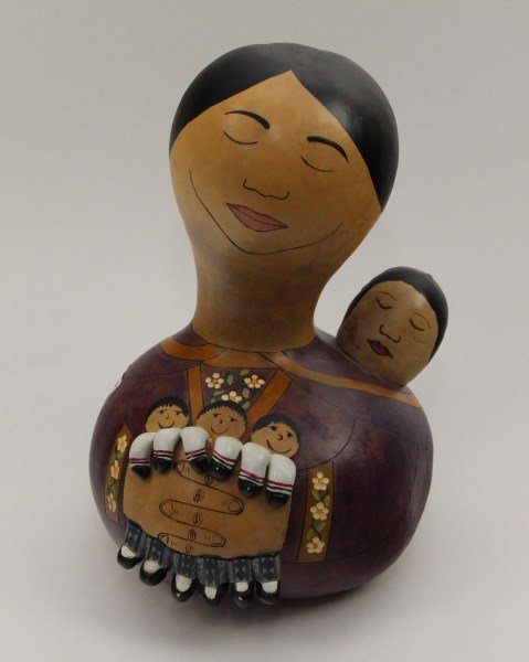 GOURD FIGURE OF MOTHER & CHILDREN: INUIT SIGNED IN SYLLABICS TO BASE 10"