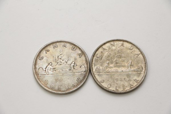 TWO CANADIAN SILVER DOLLARS (1 of 2)