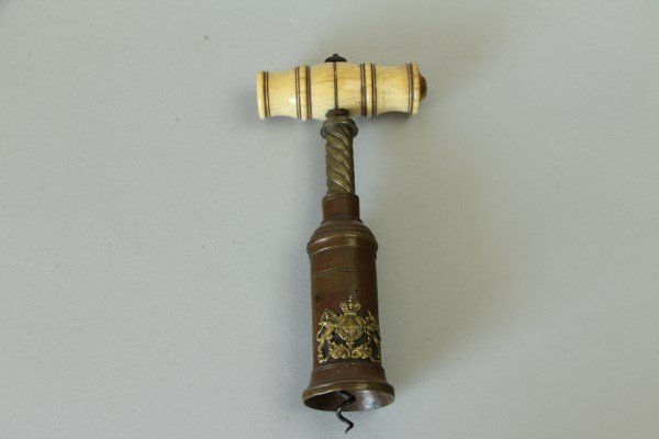 VICTORIAN BRASS COPPER AND BONE BOTTLE OPENER: BEARING ROYAL COAT OF ARMS 7" L