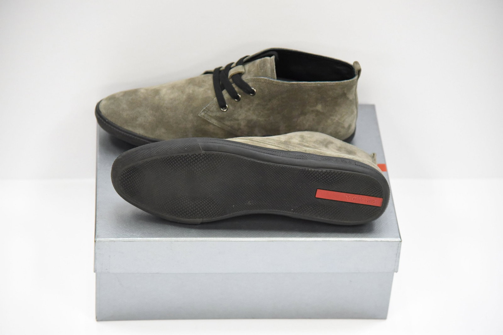 PRADA SUEDE VELOUR Mens ANKLE SHOES Size 12: PRADA IN EXCELLENT CONDITION Mens Suede Velour 3 Ankle Lace Up Shoes in Muschio (Olive Green) Color, size 12. Contrast rubber sole, Prada logo on outer tongue. Imported. Comes in original Prada shoe b