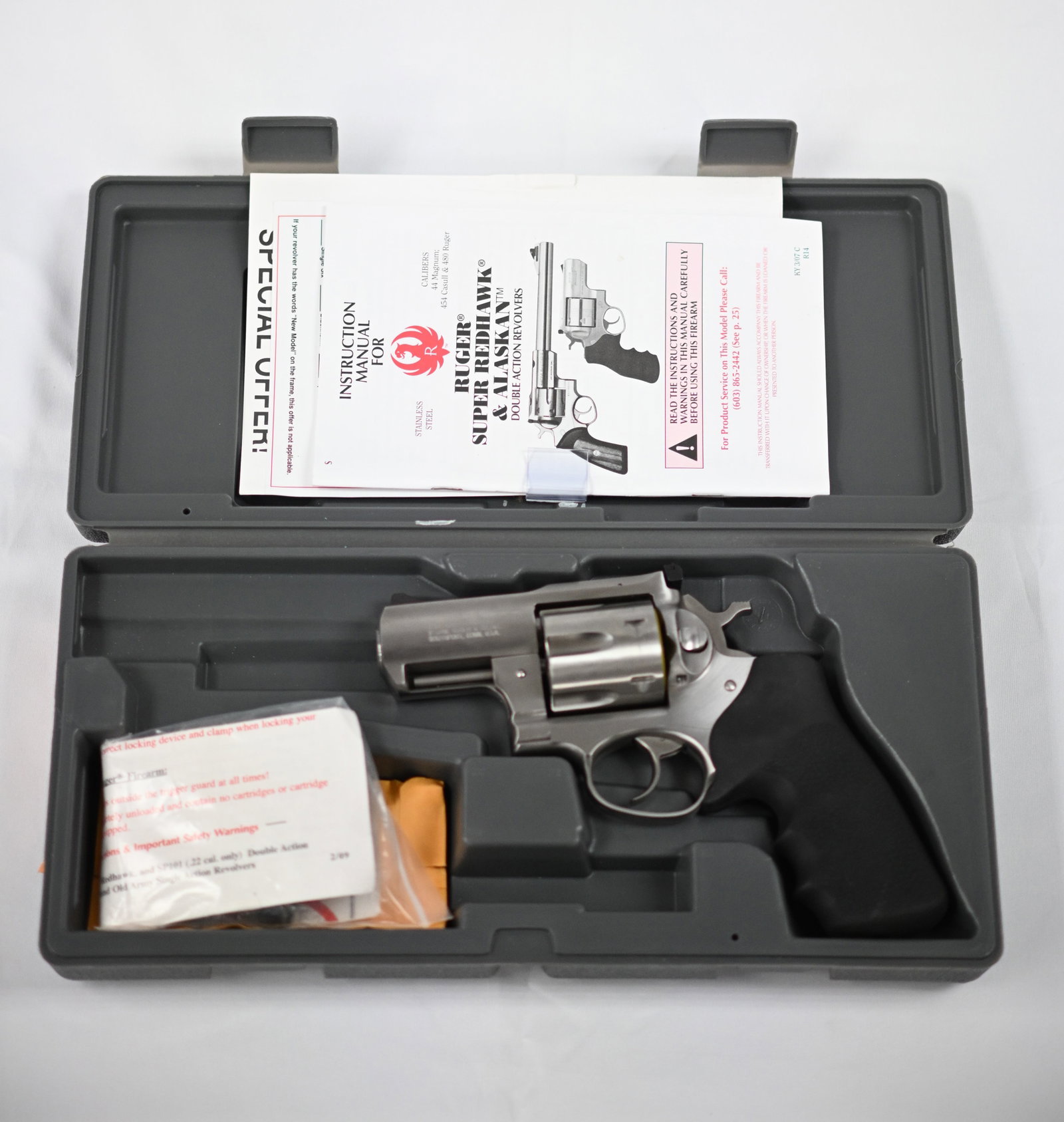 Ruger Super Redhawk Alaskan .44 Mag Stainless Steel Snubnose Revolver NEW OLD STOCK with Box and Pap: A Ruger Super Redhawk Alaskan .44 Magnum snub nose revolver in satin stainless steel - unfired, New Old Stock in the original box with papers and test fire bullet. Key Features: Ruger Super Redhawk Al