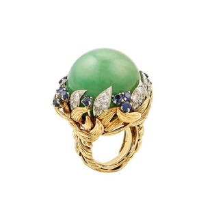 18Kt YG David Webb Jade Cabochon Ring: Stunning David Webb 18Kt Yellow Gold & Platinum Jade Cabochon Ring accented with sapphires and diamonds. Circa 1980. It is 35mm high at the front, ring size 6,. 71.7 grams W40863