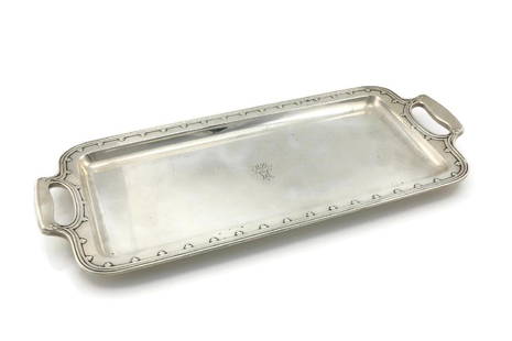 Tiffany & Co Makers Sterling Serving Tray: Sterling silver serving tray by Tiffany & Co. It is in overall great condition not showing any major visible dents or dings. It is 18 1/2" long x 8 1/4" wide and weighs 43.75ozt. wpm893304 Please revi