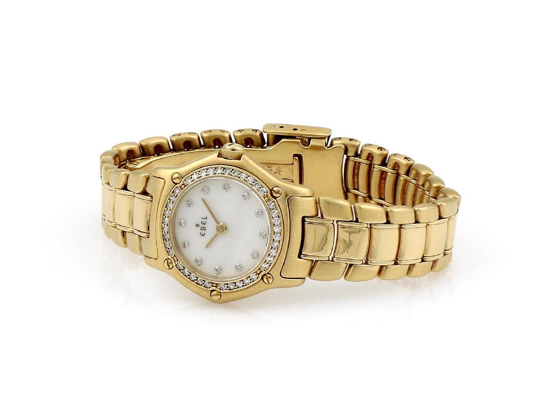 Yellow Gold Ebel 1911 Diamond Quartz Watch: Ladies Ebel 1911 in 18k yellow gold. Featuring diamond bezel and a diamond white mother of pearl dial. It has a 25mm case and a 5" bracelet size. In great condition, lightly worn. pj29565 Please revie