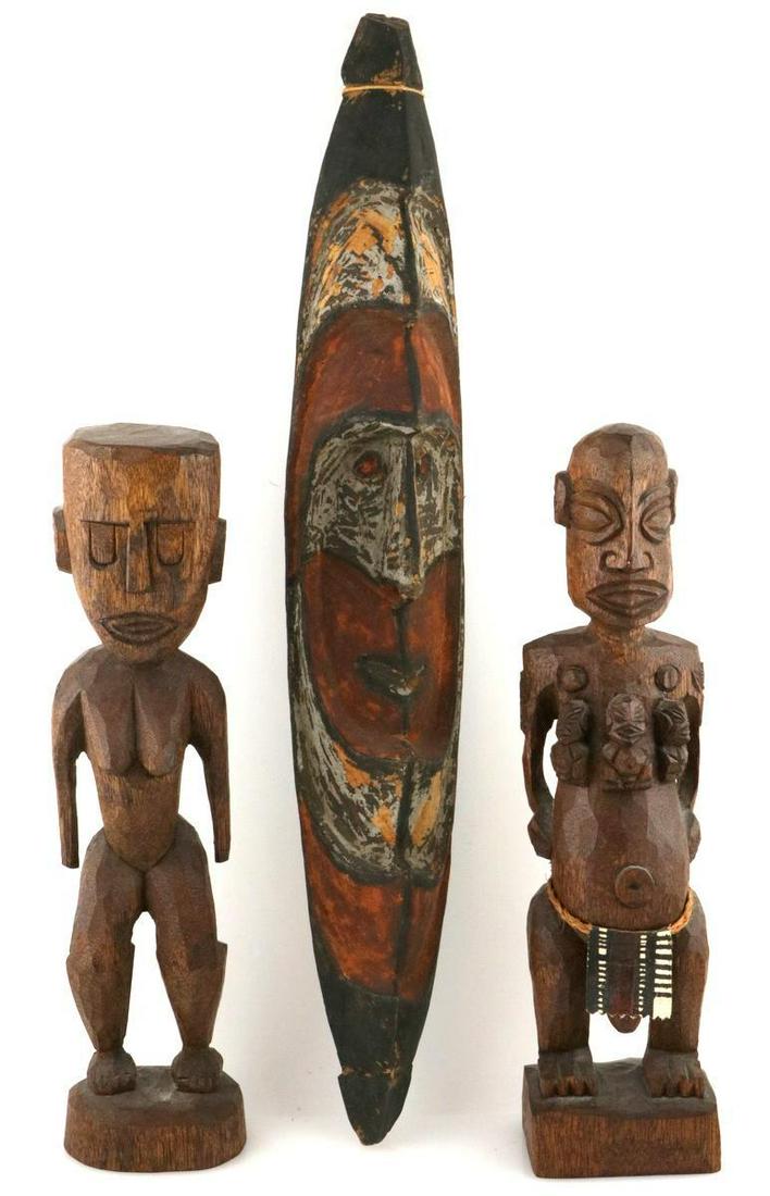 Lot of 3 African Wooden Carvings: Lot of 3 African Wooden Carvings. Figures measure - 14 1/2" high. Wall hanging measures - 23" long. Please review all photos closely. Contact us for more detailed information if necessary. Market Auct