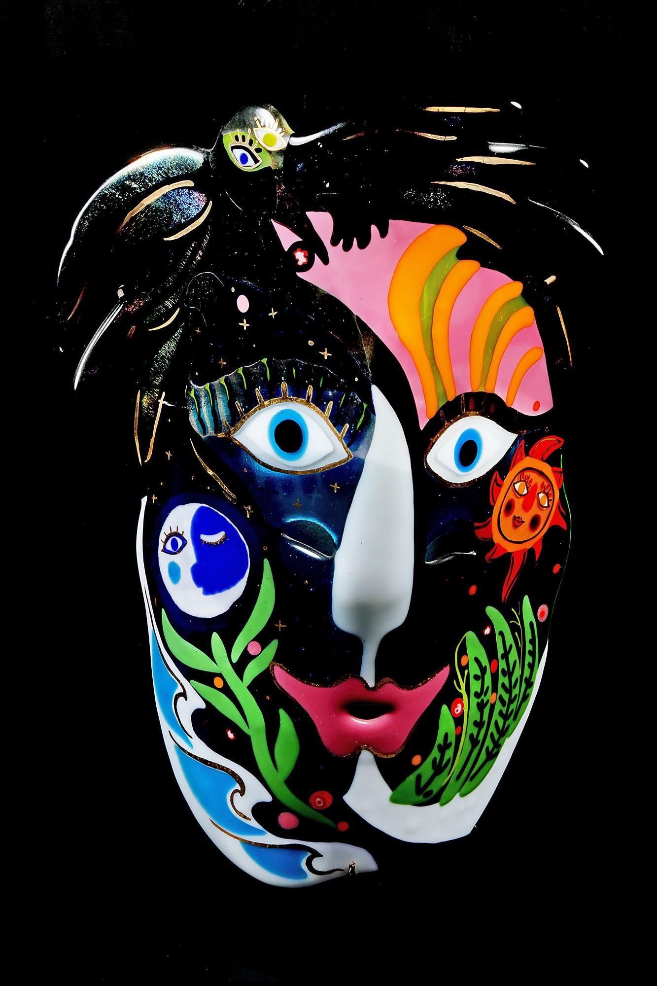 Art Glass Mask by Ruth Brockman: Art Glass Mask by Ruth Brockman 16" H x 12" W Please review all photos closely. The nonappearance of a condition report does not mean that the lot is in perfect condition, does not show wear due to ag