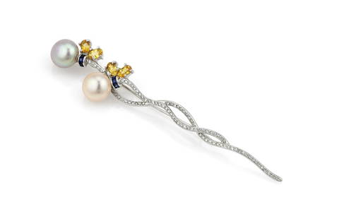 Sapphire Diamond & Pearl Pin Brooch in 18K White: Beautiful brooch in 18k white gold featuring 0.24ctw of blue sapphire, 1.24ctw of yellow sapphire, 2 10m pearls and 0.40ctw of diamond pave. It is 89mm x 17mm and weighs 8 grams. In excellent