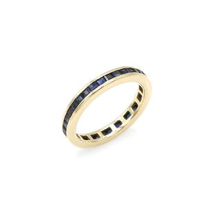 14K Yellow Gold Sapphire Eternity Band: Eternity band in 14k yellow gold featuring vibrant blue sapphire gemstones. It is 3mm wide, a size 7, and weighs 3.3 grams. wsalr06601 ***FREE JEWELRY SHIPPING FOR OUR VIRTUAL ONLINE ONLY