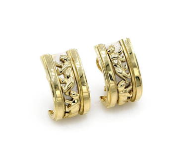14K 2 Tone Gold Panther Huggie Earrings: Huggie earrings in 14k yellow and white gold featuring a unique 3d panther design running up the center. They are 26mm x 15mm and weigh 19.8 grams. ***FREE JEWELRY SHIPPING FOR OUR VIRTUAL ONLINE