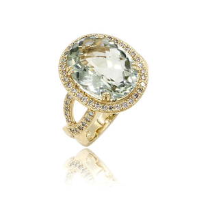 14K Yellow Gold Prasiolite and Diamond Ring: 14k yellow gold ring featuring a bright and colorful prasiolite gemstone surrounded by a row of diamonds weighing approx 0.25ctw. It is 19mm wide at the top, a size 8.75, and weighs 8.1 grams.