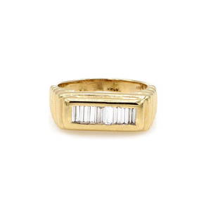 14K Yellow Gold Ribbed Baguette Diamond Ring: 14k yellow gold ring featuring approx 0.50ctw of baguette diamonds along with a unique ribbed design. It is 8mm wide at the top, a size 7.25, and weighs 7 grams. Lightly worn. wsalr090 ***FREE