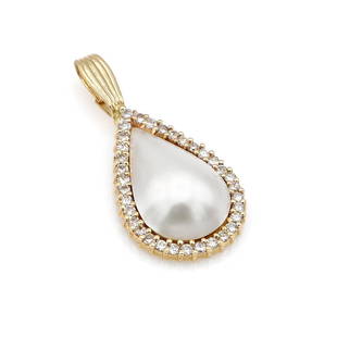 14K Yellow Gold Mabe Pearl and Diamond Pendant: Pendant in 14k yellow gold featuring a pear shape 21mm mabe pearl surrounded by a row of diamonds weighing approx 0.75ctw. It is 38mm long inc. the bail x 18mm wide and weighs 5.3 grams. wsaln00901 