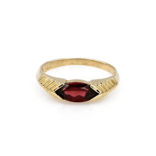 14K Yellow Gold Garnet Solitaire Ring: 14k yellow gold ring featuring a vibrant marquise garnet gemstone. It is 5mm wide at the top, a size 7.25, and weighs 3.3 grams. wsalr0016 ***FREE JEWELRY SHIPPING FOR OUR VIRTUAL ONLINE