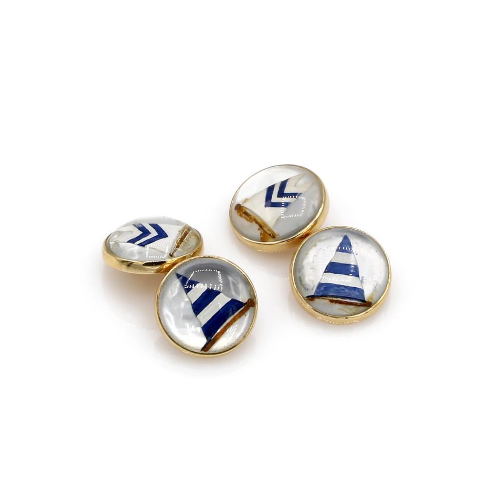 Tiffany & Co 14K Yellow Gold Sailboat Enamel Cufflinks: Cufflinks by Tiffany & Co in 14k yellow gold featuring enamel over white mother of pearl depicting little sailboats. Minor loss to the enamel. Please view all photos. Signed Tiffany & Co along with th