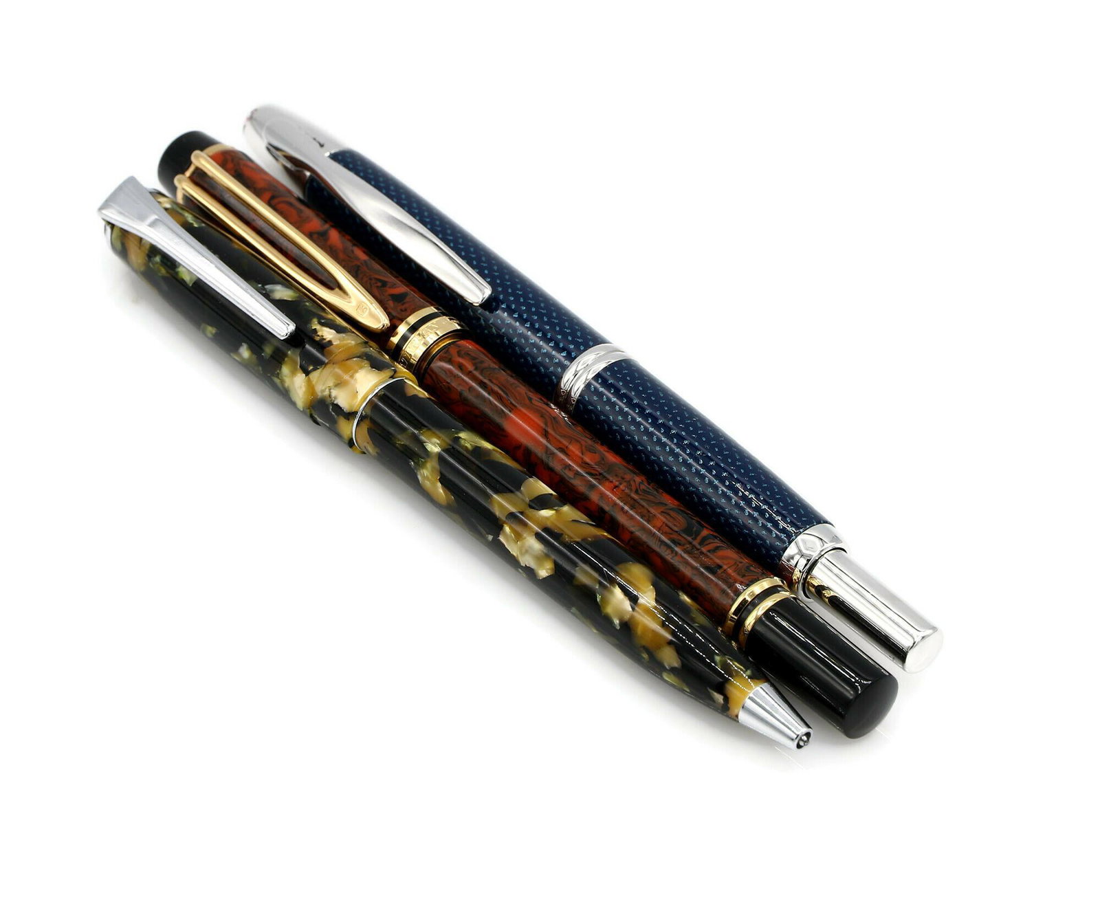 Lot of 3 Designer Pens: Lot consists of 1 unsigned ball point, 1 Pilot retractible fountain pen with 14k yellow gold nib, and 1 Waterman fountain pen with 18k yellow gold nib. Pens are in overall good condition, just may sho