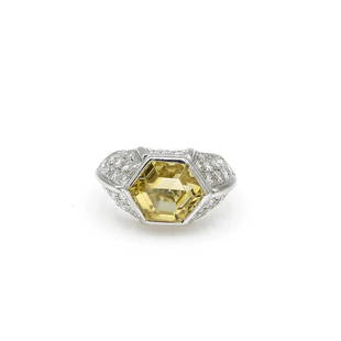 18K White Gold Yellow Topaz and Diamond Ring: Lovely ring in 18k white gold featuring a yellow topaz gemstone accented with approx 1.00ctw of diamond pave. It is 12mm wide, a size 5.75, and weighs 9.2 grams. wsalr055 Shipping for jewelry