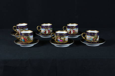 12 Piece Kaufmann Royal Vienna Tea Set: 12 piece cup and saucer set by Royal Vienna signed Kauffmann. Set consists of 6 cups and 6 saucers. Set is in great condition just showing very minor guilding loss here and there on the edges of the