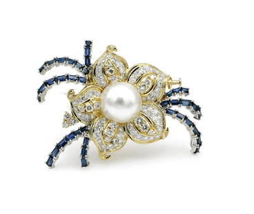 18K 2 Tone Gold Pearl Diamond & Sapphire Flower Brooch: Gorgeous brooch in 18k yellow and white gold featuring a 14.8mm South Sea cultured pearl along with approx 2.90ctw of diamond pave. The brooch is 65mm x 45mm and weighs 30.2 grams. wsalp051 