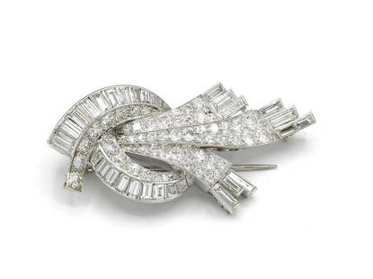 French Deco Platinum 8ct Diamond Brooch: Deco brooch in platinum featuring 91 diamonds weighing approx 8.00ctw of diamonds with G-H color and VS clarity. Circa 1930's, please see photos for French hallmarks. Measures 51mm x 26mm and