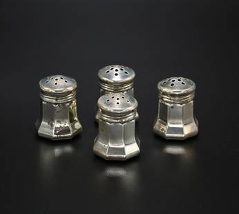 Set of 4 Sterling Silver Cartier Salt & Pepper Shakers: 4 sterling silver salt and pepper shakers by Cartier with original . Presented in original Cartier box. Shakers do show some denting here and there. Signed Cartier sterling on the bottom. They