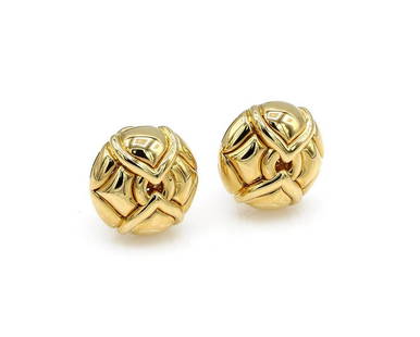 Bvlgari Bulgari 18K YG Circular Clip On Earrings: Fancy clip on earrings in 18k yellow gold by Bvlgari. They are 19mm in size and weigh 20.7 grams. wpm852901 Have a similar item to sell? Contact us at info@marketauctionsinc.com Shipping