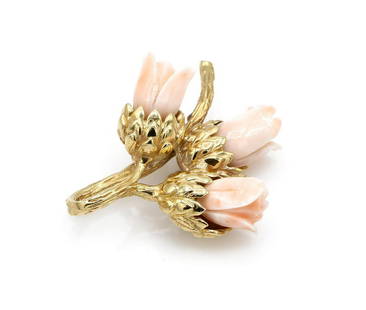 14K Yellow Gold Angel Skin Coral Flower Brooch: 14K Yellow Gold Angel Skin Coral Flower Brooch featuring 3 carved angel skin coral roses. 48mm long x 42mm wide, 22.2 grams. w40917b Have a similar item to sell? Contact us at